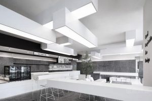 辦公室裝修設(shè)計(jì)咖啡廳休息區(qū)黑白色調(diào)現(xiàn)代簡(jiǎn)約金屬座椅加厚簡(jiǎn)約地毯裝修