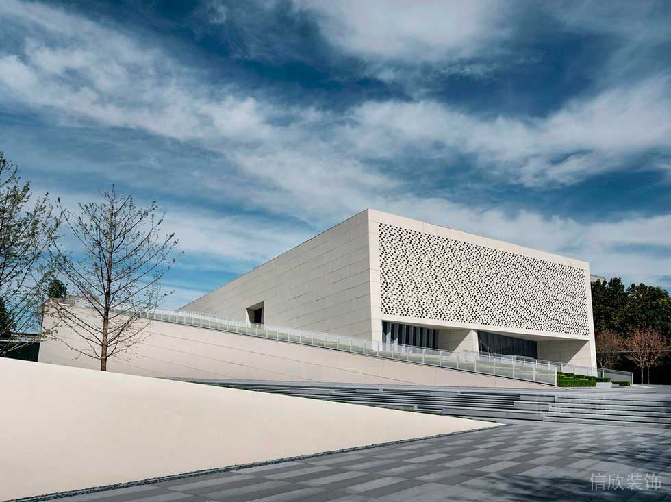 弧線辦公樓裝修效果圖鏤空墻體效果圖地毯現(xiàn)代風效果