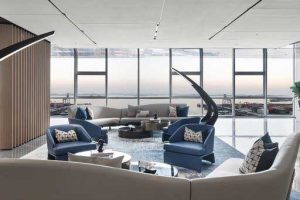 藍色沙發辦公室洽談區落地玻璃裝修圖