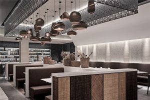 深圳龍華壹成中心現(xiàn)代新中式風格餃子館裝修案例用餐大廳效果圖