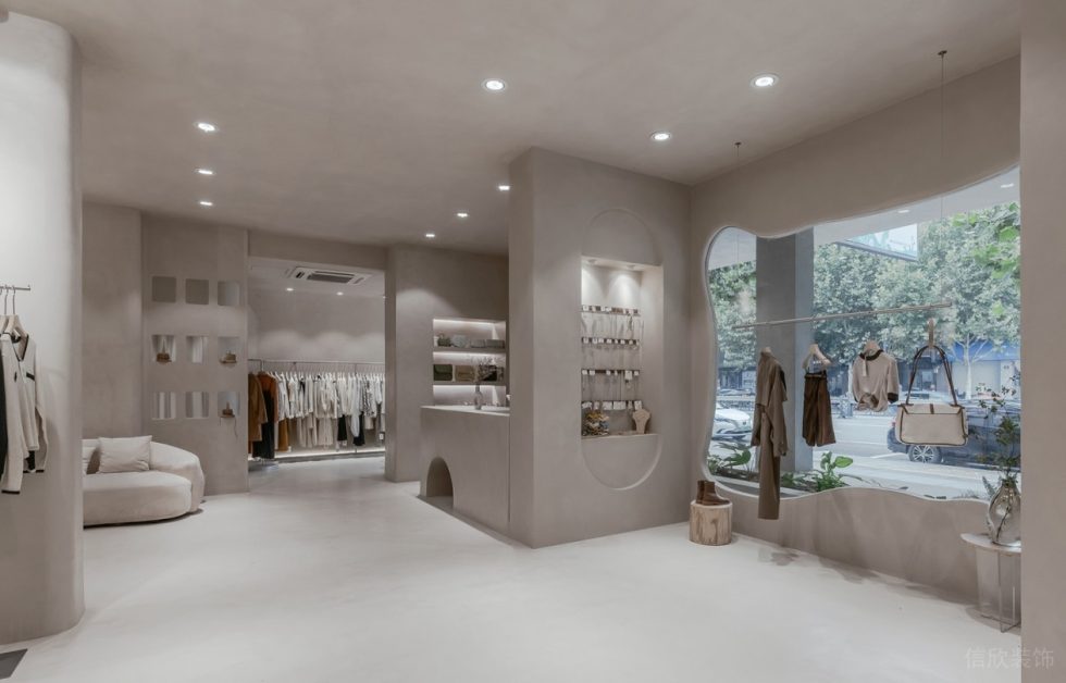 深圳市南山區(qū)前海現(xiàn)代風(fēng)女裝店裝修設(shè)計(jì)淺色水泥頂面