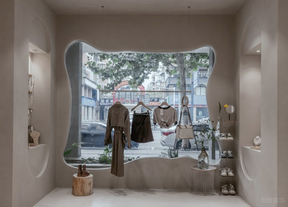 深圳市南山區(qū)前海現(xiàn)代風(fēng)女裝店裝修設(shè)計(jì)造型透明玻璃墻