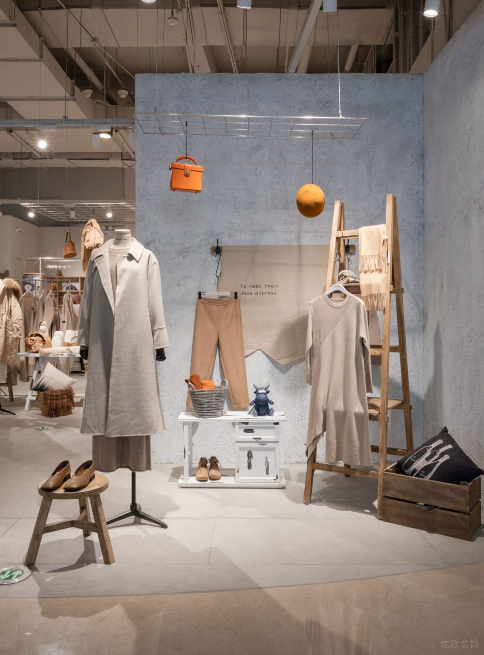 深圳市龍華區大浪現代風jane Express服裝店鋪裝修設計灰色水泥背景墻 深圳市龍華區大浪現代風jane Express服裝店鋪裝修設計灰色水泥背景墻