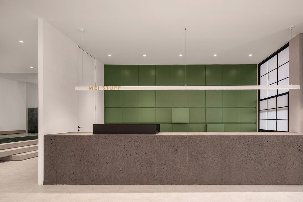 深圳市寶安區松崗wei Stuff服裝店裝修設計-咖色水磨石前臺 深圳市寶安區松崗wei Stuff服裝店裝修設計-咖色水磨石前臺