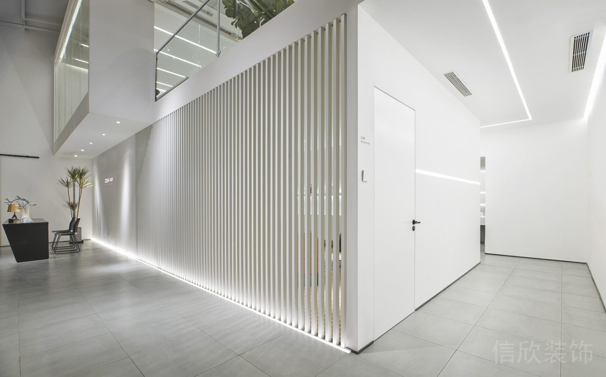 現(xiàn)代簡約風辦公室裝修設計鏤空白色拐角裝修