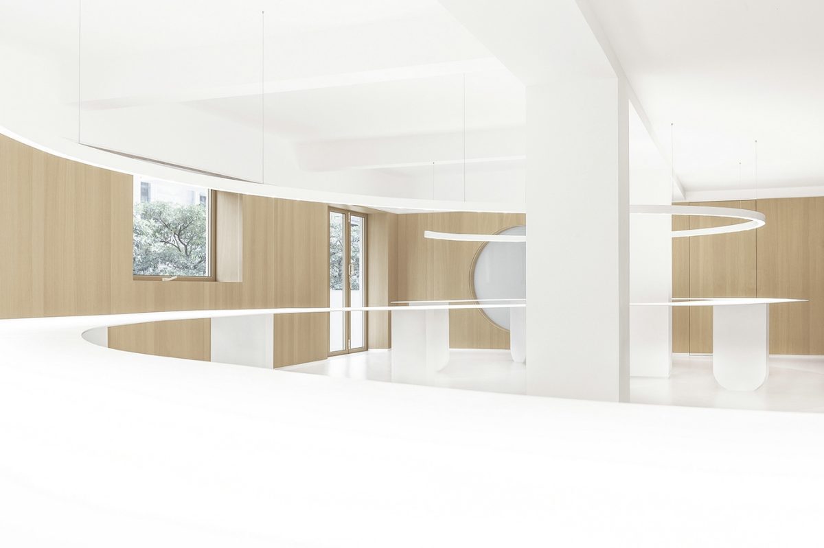 流線型設(shè)計白色設(shè)計效果實木裝修工位深圳辦公室裝修圖